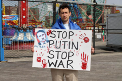 March 19, 2022  New York,  Coney Island
 Hands off Ukraine! /???? ????? ?? ???????!
 LGBTIQ  Russian - Speaking Americans group sponsored a march against Russia on the Coney Island Boardwalk." we are going to march in solidarity with Ukraine. We are going to show our position on the matter as a Ukrainian and Russian-speaking diaspora in New York. Today we are all Ukrainians. Glory to Ukraine!"