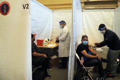People in New York City lined up at Vanderbilt Hall at Grand Central Station and Penn Station to receive their Covid Vaccine at Pop Up Sites that are in all 5 Boroughs. They received the Johnson and Johnson vaccine and received a free week long Metro Card or 2 free rides on the Long Island Railroad on 12 May 2021