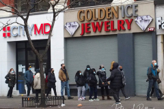 People waiting in line to receive the free Binax #COVID19 testing kits on West 125th Street in Harlem, New York City on 24 Dec 2021. The line was over 2 Avenues long.