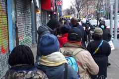 People waiting in line to receive the free Binax #COVID19 testing kits on West 125th Street in Harlem, New York City on 24 Dec 2021. The line was over 2 Avenues long.