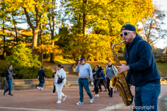 Late afternoon sun in Central Park 11/10/21.  The fine weather brought out simple pleasures.  A sax player Sam, makes use of a mild fall day in Central Park.