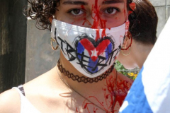 Cuban Americans Rally in front of the United Nations building in New York City. Protestors cover themselves in blood to protest the Human rights violations on the cuban people.