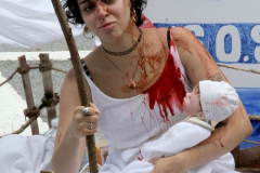 Cuban Americans Rally in front of the United Nations building in New York City. Protestors cover themselves in blood to protest the Human rights violations on the cuban people.