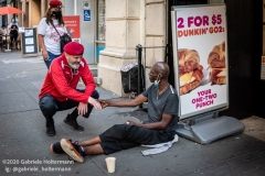 Curtis Sliwa, founder of the Guardian Angels, speaks to an unsheltered man while patroling the Upper West Side in New York City on August 9, 2020.  The neighborhood has experienced an uptick in crime and drugs after hotels have been turned into homeless shelters. (Photo by Gabriele Holtermann)