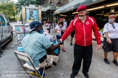 Curtis Sliwa, founder of the Guardian Angels, greets to a street vendor while patroling the  Upper West Side in New York City on August 9, 2020. Residents have complained about an uptick in crime and drugs as well as the housing of sexual offenders in the neighborhood after hotels in the neighborhood have been turned into homeless shelters. (Photo by Gabriele Holtermann)