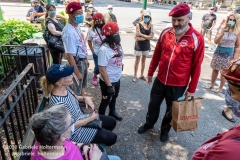 Curtis Sliwa, founder of the Guardian Angels, talks to two women before addressing Upper West Siders aboout the hotels turned homeless shelters in New York City on August 9, 2020. Residents have complained about an uptick in crime and drugs as well as the housing of sexual offenders in the neighborhood.(Photo by Gabriele Holtermann)