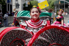 Dancers performing all manner of dance and dressed in all kinds of costumes participate in the 16th annual New York Dance Parade in Manhattan NY on May 21, 2022. The annual parade made its return after being cancelled due to the COVID-19 pandemic with the theme of "Back to the Streets." (Photo by Andrew Schwartz)