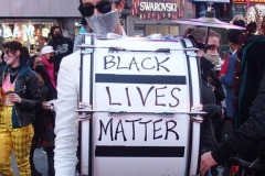 Day of The Dead and Black Lives Matters participants march through Times Square.