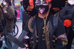 Day of The Dead and Black Lives Matters participants march through Times Square.