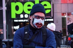 Day of The Dead and Black Lives Matters participants march through Times Square.