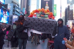 Day of The Dead and Black Lives Matters participants march through Times Square.