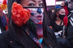 Day of The Dead and Black Lives Matters participants march through Times Square.
