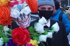 Day of The Dead and Black Lives Matters participants march through Times Square.