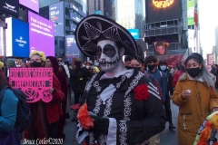 Day of The Dead and Black Lives Matters participants march through Times Square.