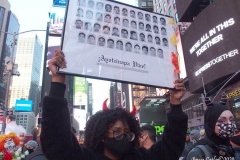 Day of The Dead and Black Lives Matters participants march through Times Square.