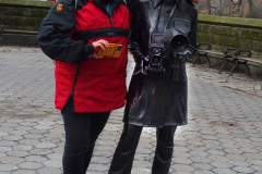 Photography fans pose with the bronze statue honoring the late photographer Diane Arbus by British conceptual artist Gillian Wearing in Doris C. Freedman Plaza in Central Park in New York City until August 14, 2022. The statue is presented by Public Art Fund