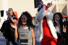 DMX's daughter waves to fans during DMX funeral at Christian Cultural Center.