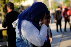 A fan of DMX is overcome with grief at the late rapper's fueral procession in Brooklyn, New York on Sunday, April 25th.
