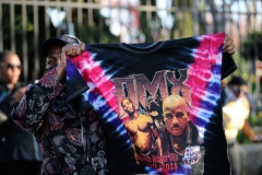 A fan of DMX holds a shirt during a funeral procession at Christian Cultural Center in the borough of Brooklyn, New York.