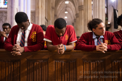 Seniors from Hayes Catholic High School pray during a mass with Cardinal Timothy Dolan at St. Patrick’s Cathedral in New York, New York, on May 18, 2022. (Photo by Gabriele Holtermann/Sipa USA)