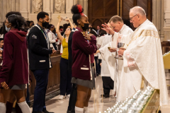 Cardinal Timothy Dolan blesses a High School senior at mass with nearly  2,000 graduating Catholic High School seniors at St. Patrick’s Cathedral in New York, New York, on May 18, 2022. (Photo by Gabriele Holtermann/Sipa USA)