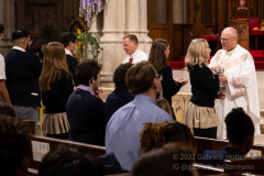 Cardinal Timothy Dolan gives communion to a High School senior at mass with nearly  2,000 graduating Catholic High School seniors at St. Patrick’s Cathedral in New York, New York, on May 18, 2022. (Photo by Gabriele Holtermann/Sipa USA)