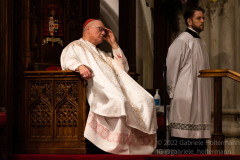 Cardinal Timothy Dolan prays after communion  with nearly 2,000 graduating Catholic High School seniors at St. Patrick’s Cathedral in New York, New York, on May 18, 2022. (Photo by Gabriele Holtermann/Sipa USA)