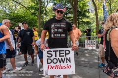 A young man attends  the "Don't Give Up the Ship" rally outside City Hall Park in New York City on August 22, 2020. The rally, led by Staten Island based artist Scott LoBaido, called out the Mayor's failure addressing the recent spike in gun violence and increase in homeless encampments. (Photo by Gabriele Holtermann)