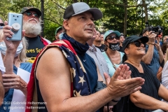 A man applauds the speakers at  the "Don't Give Up the Ship" rally outside City Hall Park in New York City on August 22, 2020. The rally, led by Staten Island based artist Scott LoBaido, called out the Mayor's failure addressing the recent spike in gun violence and increase in homeless encampments. (Photo by Gabriele Holtermann)