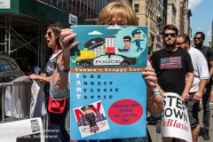 A woman holds a poster about the bail reform at  the "Don't Give Up the Ship" rally outside City Hall Park in New York City on August 22, 2020. The rally, led by Staten Island based artist Scott LoBaido, called out the Mayor's failure addressing the recent spike in gun violence and increase in homeless encampments. (Photo by Gabriele Holtermann)