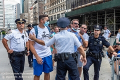 NYPD officers diffuse a tense situation between Black Lives Matter protestors and Blue Lives Matter protestors after  the "Don't Give Up the Ship" rally outside City Hall Park in New York City on August 22, 2020. The rally, led by Staten Island based artist Scott LoBaido, called out the Mayor's failure addressing the recent spike in gun violence and increase in homeless encampments. (Photo by Gabriele Holtermann)