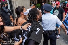 NYPD officers diffuse a tense situation between Black Lives Matter protestors and Blue Lives Matter protestors after  the "Don't Give Up the Ship" rally outside City Hall Park in New York City on August 22, 2020. The rally, led by Staten Island based artist Scott LoBaido, called out the Mayor's failure addressing the recent spike in gun violence and increase in homeless encampments. (Photo by Gabriele Holtermann)