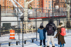 East River Park Protest & Details		

Protesters gathered in East River Park to prevent contracted construction workers from cutting down trees for headway on the ESCR - East Side Coastal Resiliency project, an effort of the city to build a levee that will provide flood control.
According to public plans, a 1.2 mile wall with razed park over an 8 foot fill will line the East River, requiring the expunging of an estimated 1000 trees along the river bank. Last year in December the Cherry and London Plane trees of the south section of the park were, cut and further work has resumed on northern half this January. 
Locals in the city, retaliate against the project due to what they claim to be, a thwarted joint effort for a viable solution for flooding and keeping the park in tact that is beloved and iconic component of not only the neighborhood but NYC. 
For more information: 
www.eastriverparkaction.org
January 31, 2021
East River Park, East Village, NYC 
(C) Bianca Otero