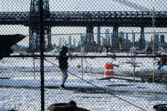 East River Park Protest & Details		

Protesters gathered in East River Park to prevent contracted construction workers from cutting down trees for headway on the ESCR - East Side Coastal Resiliency project, an effort of the city to build a levee that will provide flood control.
According to public plans, a 1.2 mile wall with razed park over an 8 foot fill will line the East River, requiring the expunging of an estimated 1000 trees along the river bank. Last year in December the Cherry and London Plane trees of the south section of the park were, cut and further work has resumed on northern half this January. 
Locals in the city, retaliate against the project due to what they claim to be, a thwarted joint effort for a viable solution for flooding and keeping the park in tact that is beloved and iconic component of not only the neighborhood but NYC. 
For more information: 
www.eastriverparkaction.org
January 31, 2021
East River Park, East Village, NYC 
(C) Bianca Otero
