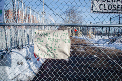 East River Park Protest & Details		

Protesters gathered in East River Park to prevent contracted construction workers from cutting down trees for headway on the ESCR - East Side Coastal Resiliency project, an effort of the city to build a levee that will provide flood control.
According to public plans, a 1.2 mile wall with razed park over an 8 foot fill will line the East River, requiring the expunging of an estimated 1000 trees along the river bank. Last year in December the Cherry and London Plane trees of the south section of the park were, cut and further work has resumed on northern half this January. 
Locals in the city, retaliate against the project due to what they claim to be, a thwarted joint effort for a viable solution for flooding and keeping the park in tact that is beloved and iconic component of not only the neighborhood but NYC. 
For more information: 
www.eastriverparkaction.org
January 31, 2021
East River Park, East Village, NYC 
(C) Bianca Otero