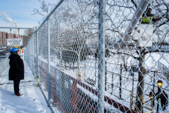 East River Park Protest & Details		

Protesters gathered in East River Park to prevent contracted construction workers from cutting down trees for headway on the ESCR - East Side Coastal Resiliency project, an effort of the city to build a levee that will provide flood control.
According to public plans, a 1.2 mile wall with razed park over an 8 foot fill will line the East River, requiring the expunging of an estimated 1000 trees along the river bank. Last year in December the Cherry and London Plane trees of the south section of the park were, cut and further work has resumed on northern half this January. 
Locals in the city, retaliate against the project due to what they claim to be, a thwarted joint effort for a viable solution for flooding and keeping the park in tact that is beloved and iconic component of not only the neighborhood but NYC. 
For more information: 
www.eastriverparkaction.org
January 31, 2021
East River Park, East Village, NYC 
(C) Bianca Otero