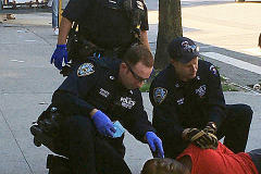 An emotionally disturbed person is arrested on West 125th Street in Manhattan after allegedly stealing items from a Duane Reade.