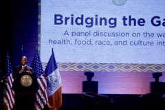 Eric Adams gives opening remarks at a lecture and vegan food tasting reception on healthy diets at The Apollo Theater.
(C) Steve Sands / New York Newswire