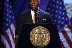 Eric Adams gives opening remarks at a lecture and vegan food tasting reception on healthy diets at The Apollo Theater.
(C) Steve Sands / New York Newswire