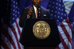 Eric Adams gives opening remarks at a lecture and vegan food tasting reception on healthy diets at The Apollo Theater.
(C) Steve Sands / New York Newswire