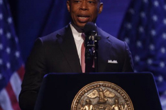 Eric Adams gives opening remarks at a lecture and vegan food tasting reception on healthy diets at The Apollo Theater.
(C) Steve Sands / New York Newswire