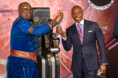 NYC & Company Kickoffs NYC Winter Outing with Mayor Eric Adams, Fred Dixon, Charlotte St. Martin, Anthony E. Malkin, Marlene Poynder, David Burke, TrenÕness Woods-Black, and Cast members from Aladdin and Chicago at the Empire State Building, 1/18/22. NYC Mayor Eric Adams with cast member of Aladdin.