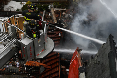 Firefighters from Ladder Company 172 operate at a building explosion at 58 Bay 35 Street. Units had heavy fire from a two story private dwelling.