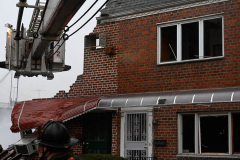 Firefighters from Ladder Company 172 operate at a building explosion at 58 Bay 35 Street. Units had heavy fire from a two story private dwelling.
