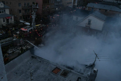 Firefighters from Ladder Company 172 operate at a building explosion at 58 Bay 35 Street. Units had heavy fire from a two story private dwelling.