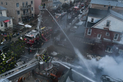Firefighters from Ladder Company 172 operate at a building explosion at 58 Bay 35 Street. Units had heavy fire from a two story private dwelling.