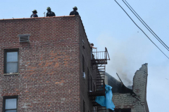 Explosion may have been suicide: An explosion that blew the roof off a Jackson Heights, Queens apartment building may have been part of suicide of a man found stabbed dead in his top-story home, police sources said Wednesday. Anesti Bulgaresti, 26, suffered from depression and other ailments and had been unemployed for two months before Tuesday morning’s explosion, cops said. The blast destoyed the 7th floor penthouse apartment and left large chunks of the wall precariously tilting towards other structures below. Its cause remains under investigation.  (Photo by Todd Maisel)
