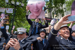FDNY firefighters of Ladder Company 45 cheer on FF Nicholas Morisano at the FDNY Medal Day 2022 at City Hall in New York, New York, on June 1, 2022. (Photo by Gabriele Holtermann/Sipa USA)