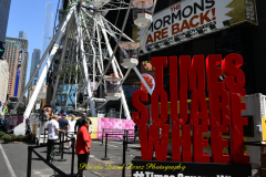 Ride a state-of-the-art ferris wheel in the Crossroads of the World, and soar up 110 feet through a canyon of spectacular billboards, getting an entirely new vantage point on Times Square. Buy tickets online or in person.
* $15 per person for children 2–10
* $20 per person for general admission
* $35 per person for VIP / Skip the line


Times Square is a major commercial intersection, tourist destination, entertainment center, and neighborhood in the Midtown Manhattan section of New York City, at the junction of Broadway and Seventh Avenue.

THE TIMES SQUARE WHEEL IS A ONCE-IN-A-LIFETIME EXPERIENCE IN THE MIDDLE OF TIMES SQUARE NYC. WE HAVE ERECTED A MAJESTIC, STATE-OF-THE-ART 110 FOOT TALL GIANT FERRIS WHEEL THAT WILL SHOWCASE THE CROSSROADS OF THE WORLD AS NEVER SEEN BEFORE. EXPERIENCE SENSORY OVERLOAD BY BILLIONS PIXELS AS YOU SOAR 110 FEET THRU A CANYON OF SPECTACULAR BILLBOARDS. COME AND SHARE THIS SPECTACULAR EXPERIENCE WITH FRIENDS AND FAMILY ALL OVER THE WORLD.