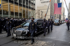 Thousands of police officers pay their respect as the hearse with the casket of fallen NYPD Officer Wilbert Mora makes its way down 5th Avenue in New York, New York, on Feb. 2, 2022. (Photo by Gabriele Holtermann/Sipa USA)